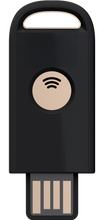 Load image into Gallery viewer, A black USB flash drive with a circular beige button featuring a wireless signal icon, shown on a plain white background.

